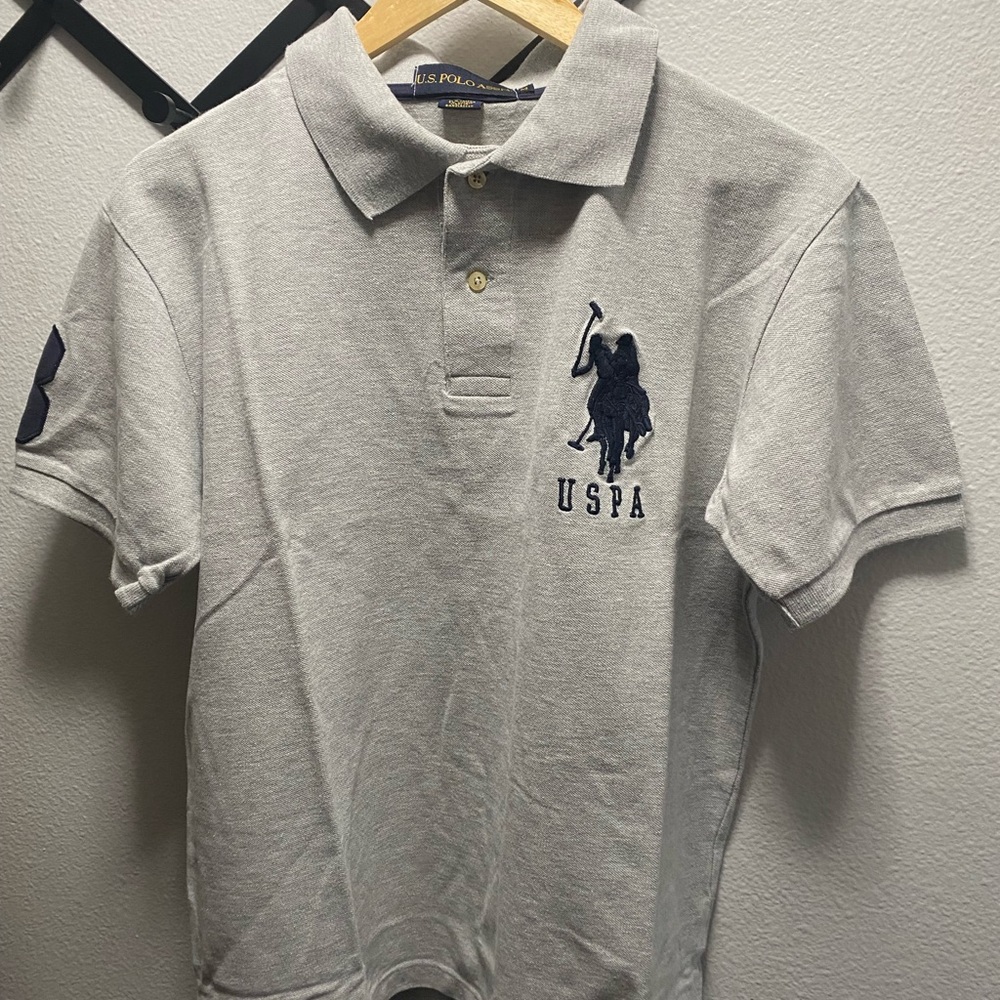 Grey polo size M